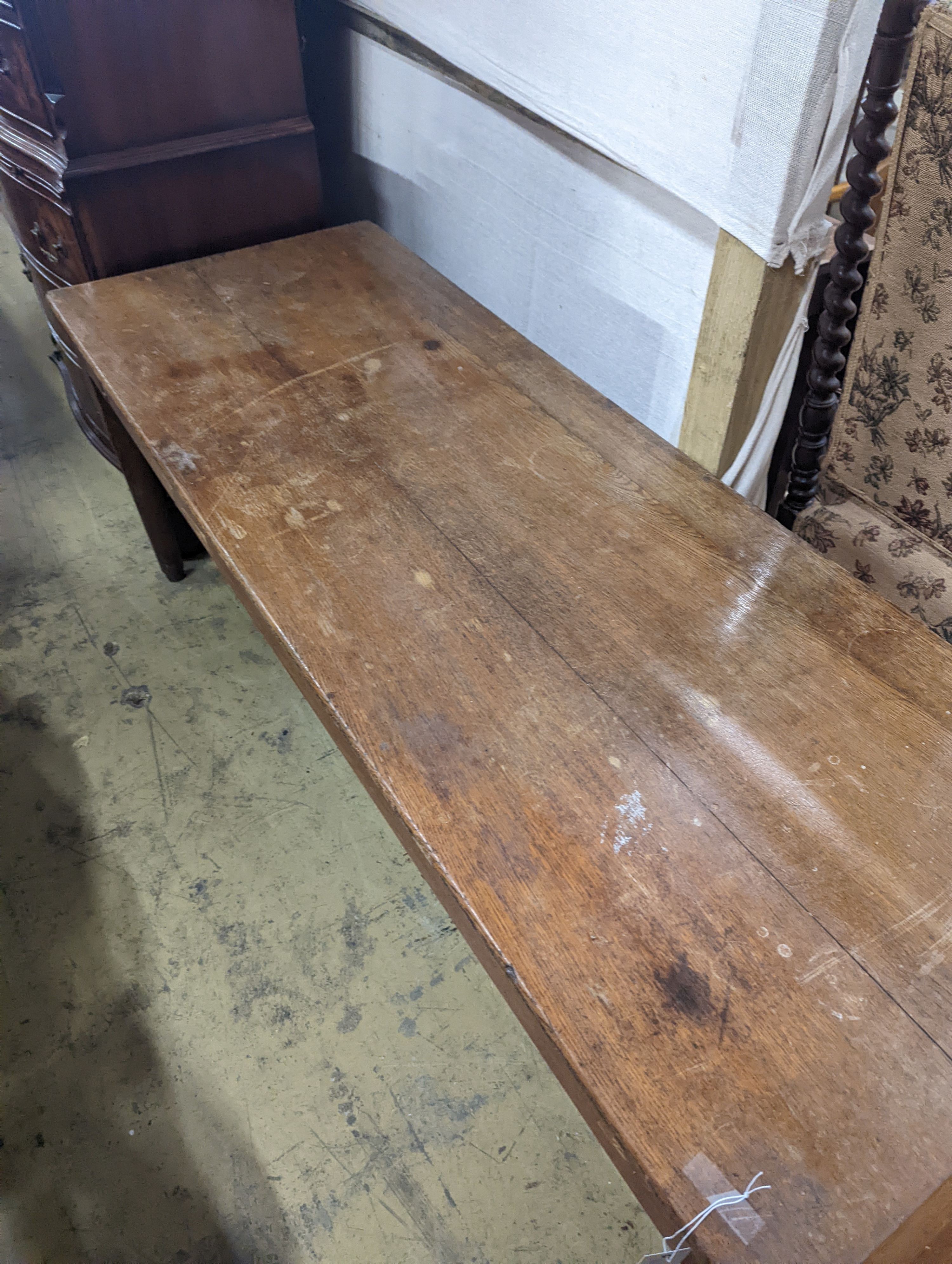 An early 20th century oak examination table, length 180cm, depth 59cm, height 74cm